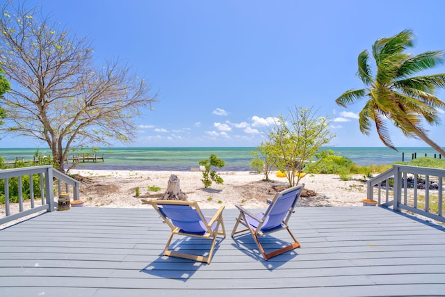 10 W Cook, Big Pine, FL 33043 - wooden terrace featuring a view of the beach and a water view