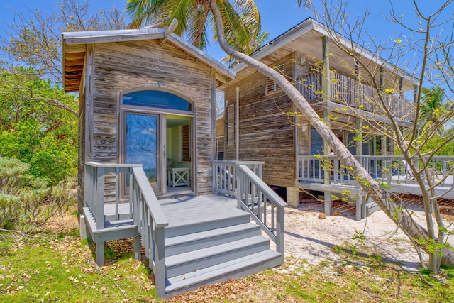 10 W Cook, Big Pine, FL 33043 - entrance to property featuring a deck and a balcony