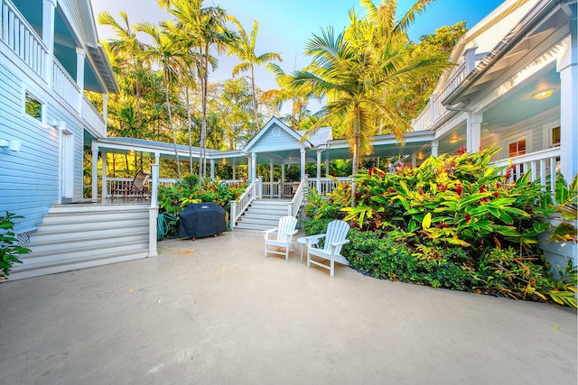 view of patio featuring a grill