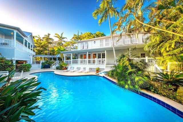 view of swimming pool with a patio area