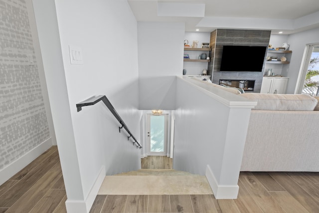 254 W Seaview Cir, Duck, FL 33050 - staircase featuring wood finished floors