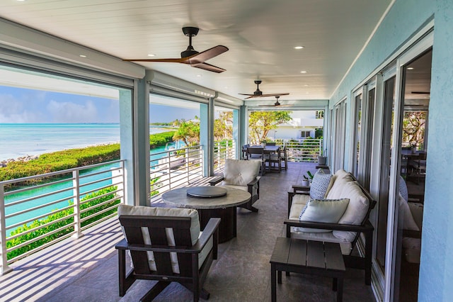 254 W Seaview Cir, Duck, FL 33050 - sunroom / solarium featuring a water view, ceiling fan, and an outdoor hangout area