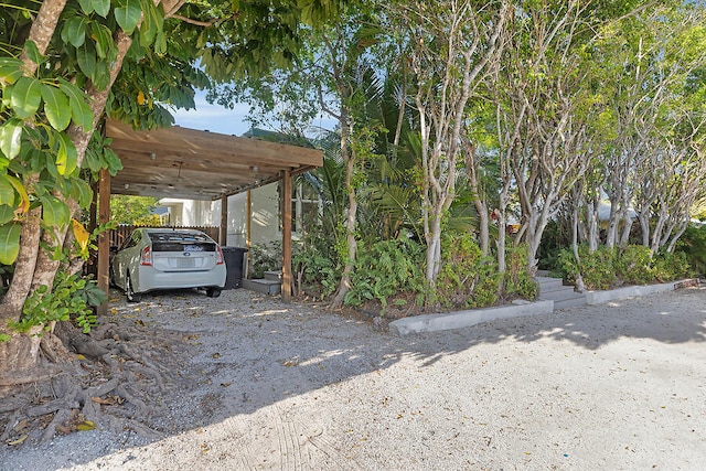 view of parking featuring a carport