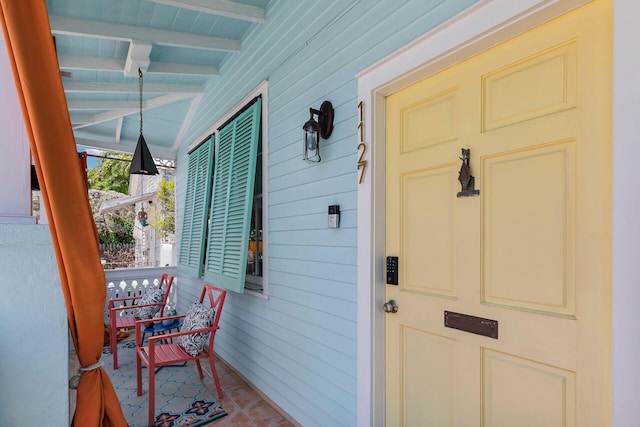entrance to property with a porch