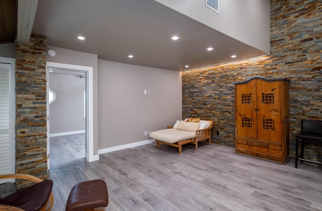 living area with light hardwood / wood-style flooring