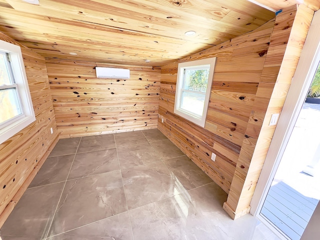 additional living space with vaulted ceiling, wooden ceiling, and wood walls