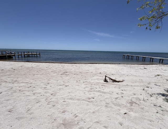 view of water feature with a beach view