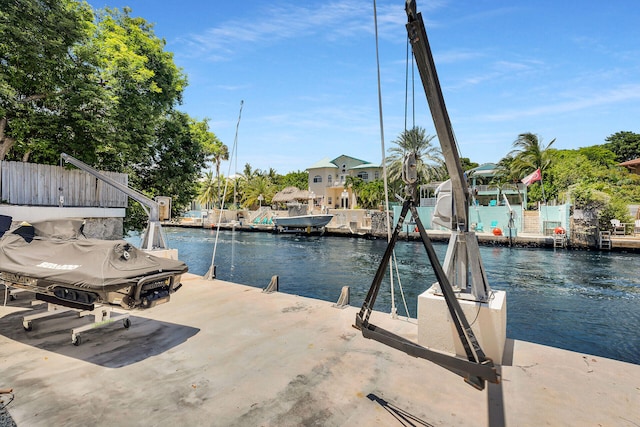 view of dock with a water view