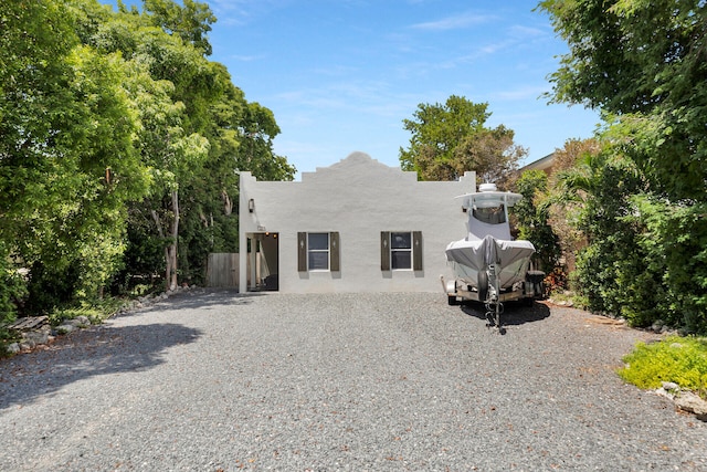 adobe home with stucco siding