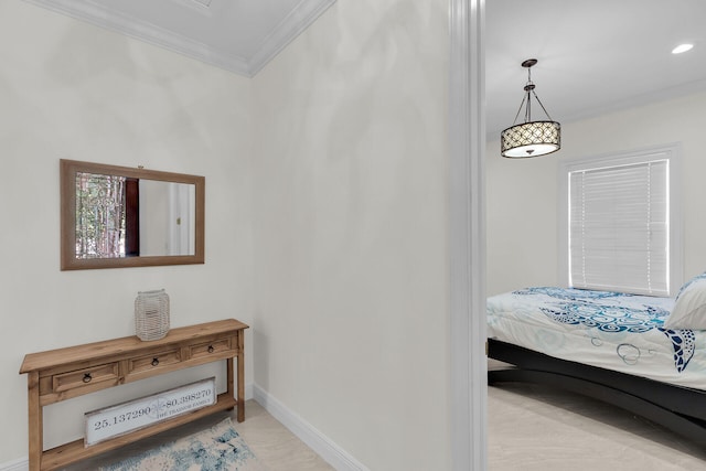 interior space featuring baseboards and ornamental molding