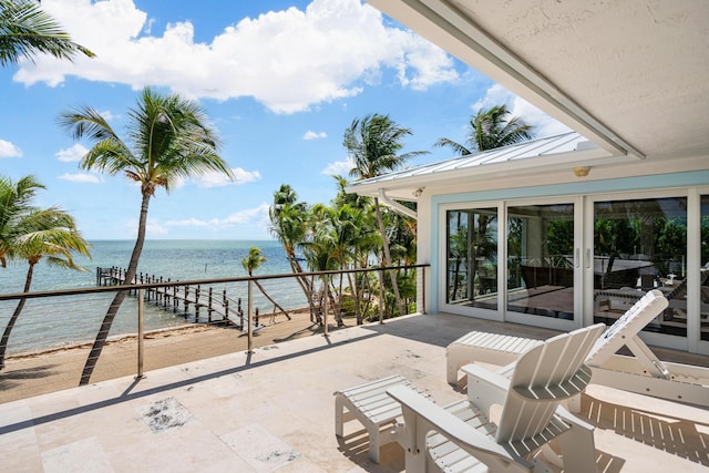 view of patio / terrace featuring a water view