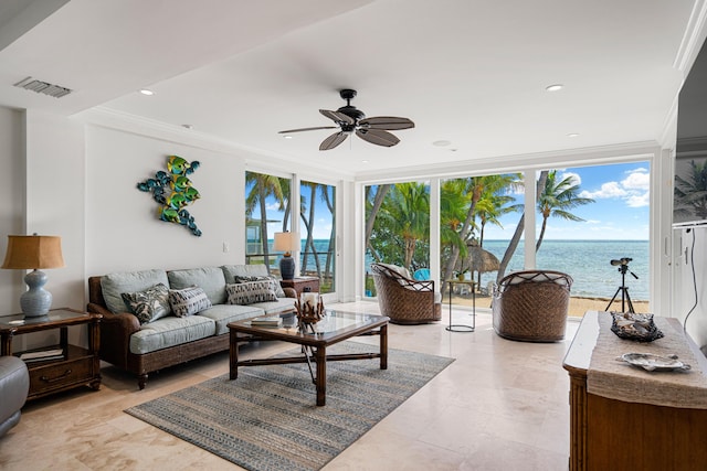 living room featuring ornamental molding, expansive windows, ceiling fan, and a water view