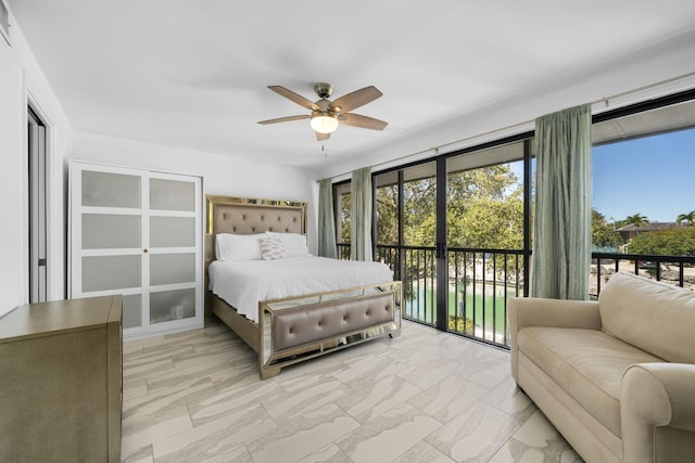 bedroom with access to exterior and ceiling fan