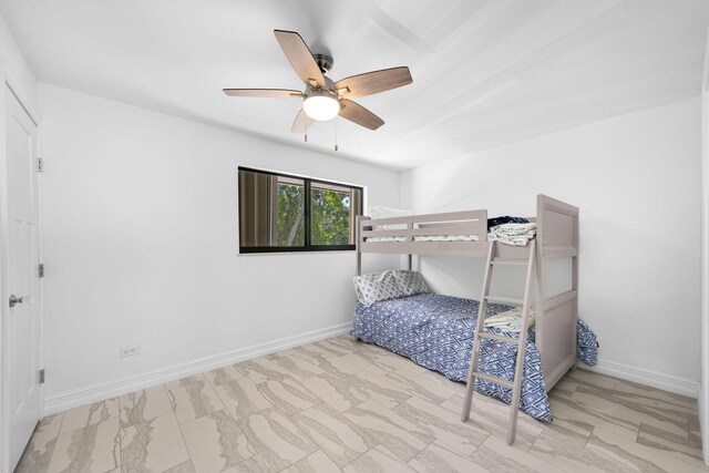 bedroom featuring ceiling fan