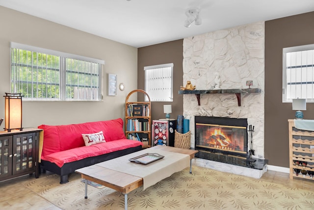 living room featuring a fireplace