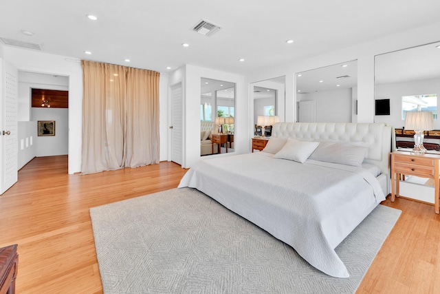 bedroom with wood-type flooring