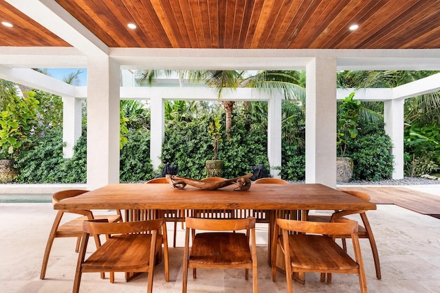 sunroom with wooden ceiling