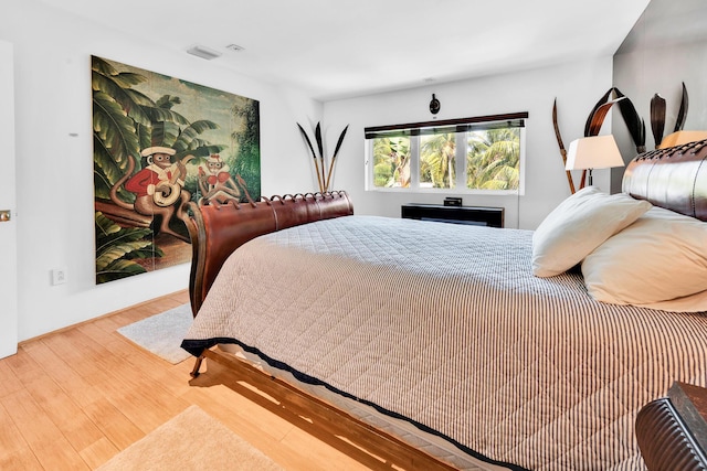 bedroom featuring wood-type flooring