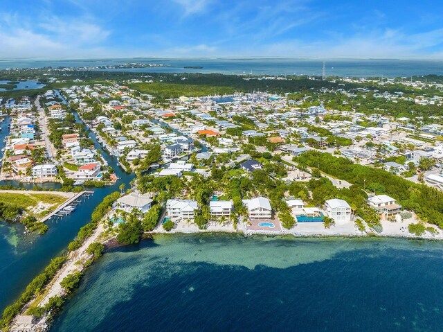 aerial view featuring a residential view and a water view