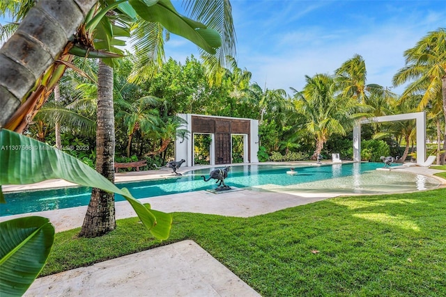 outdoor pool featuring an outdoor structure, a storage structure, a lawn, and a patio