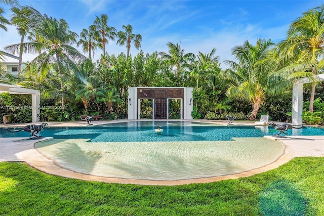 view of pool featuring an outbuilding