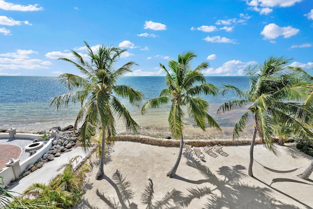 view of water feature with a beach view