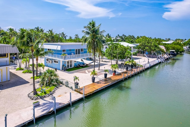 back of house with a water view