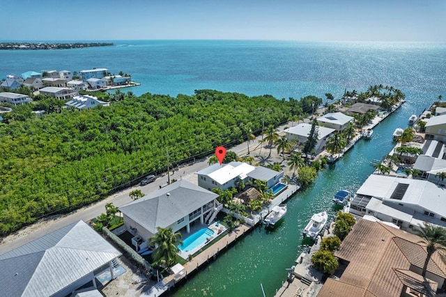 aerial view featuring a water view