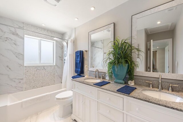 full bathroom with vanity, shower / tub combo with curtain, and toilet