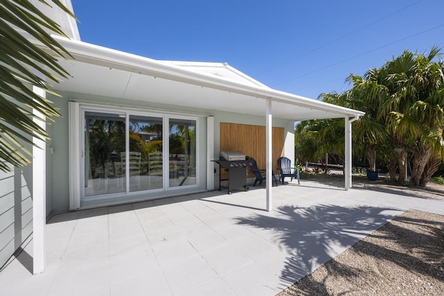 view of patio featuring a grill