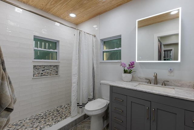 bathroom featuring a shower with curtain, vanity, wood ceiling, and toilet