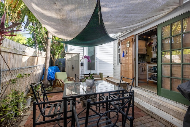 view of patio featuring a wooden deck