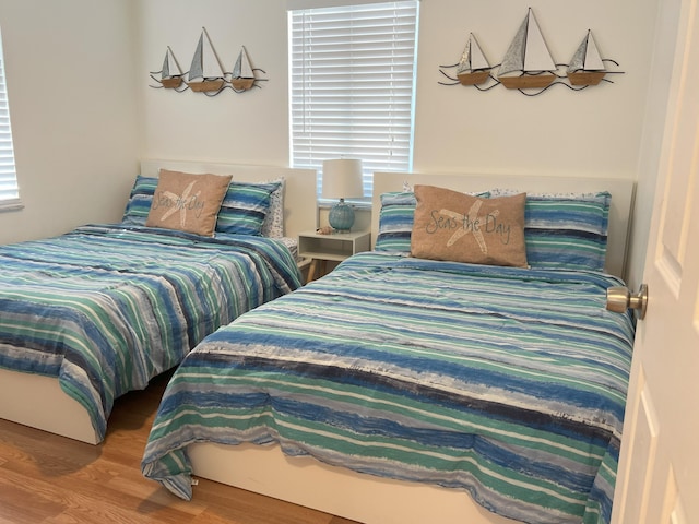 bedroom featuring hardwood / wood-style floors