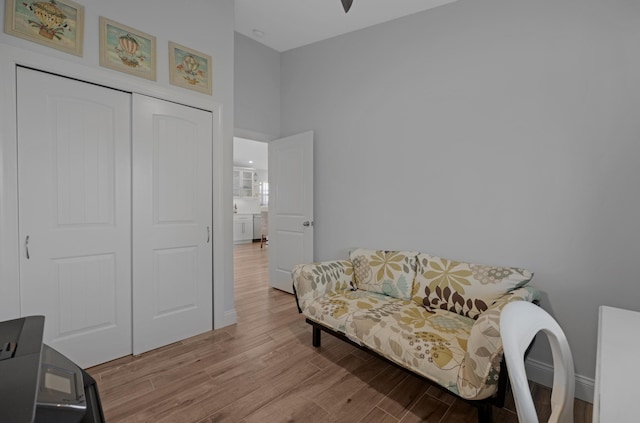 living area with light hardwood / wood-style floors