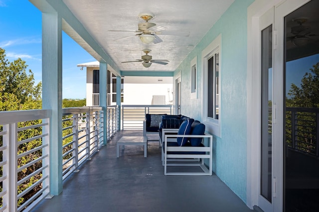 balcony featuring ceiling fan