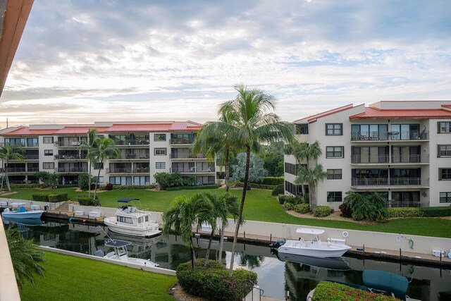 view of building exterior with a water view