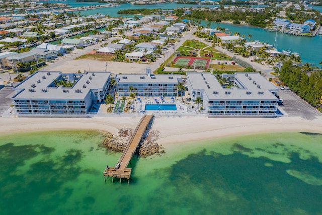 aerial view featuring a view of the beach and a water view