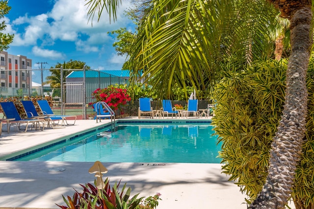 95 Coco Plum Dr Unit 5D, Marathon, FL 33050 - community pool with fence and a patio area