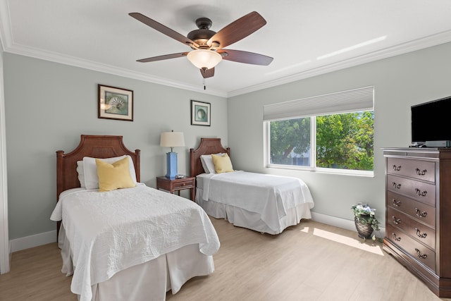 95 Coco Plum Dr Unit 5D, Marathon, FL 33050 - bedroom featuring ornamental molding, baseboards, light wood-style floors, and ceiling fan