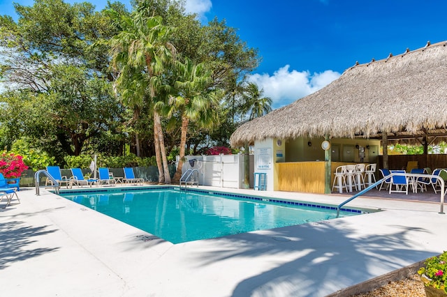95 Coco Plum Dr Unit 5D, Marathon, FL 33050 - community pool with a patio area, fence, and a gazebo