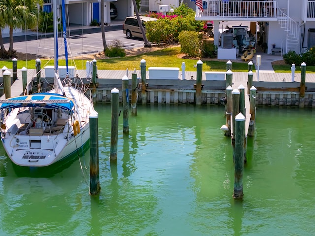 95 Coco Plum Dr Unit 5D, Marathon, FL 33050 - dock featuring a water view and stairs