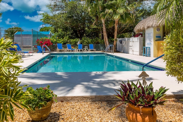 95 Coco Plum Dr Unit 5D, Marathon, FL 33050 - community pool with fence and a patio area