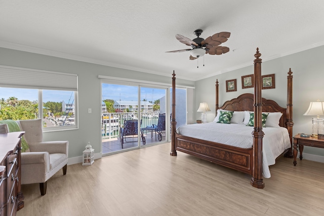 95 Coco Plum Dr Unit 5D, Marathon, FL 33050 - bedroom featuring access to exterior, crown molding, light wood-type flooring, baseboards, and ceiling fan
