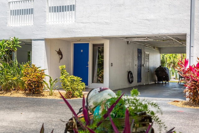 95 Coco Plum Dr Unit 5D, Marathon, FL 33050 - entrance to property featuring oil tank and stucco siding
