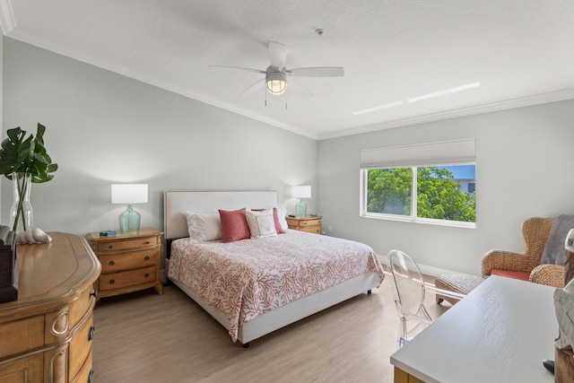 95 Coco Plum Dr Unit 5D, Marathon, FL 33050 - bedroom featuring light wood-style flooring, ornamental molding, a ceiling fan, and baseboards