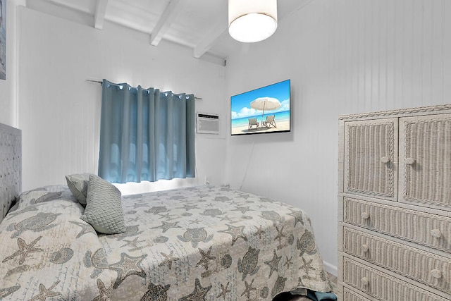 bedroom with beamed ceiling and a wall mounted AC