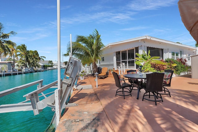 view of patio / terrace with a dock