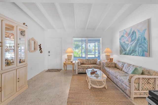 living room with beamed ceiling