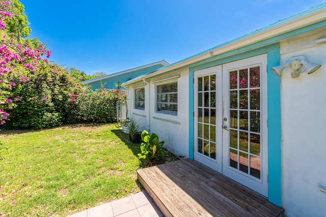 view of yard with french doors