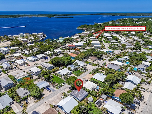 drone / aerial view featuring a water view